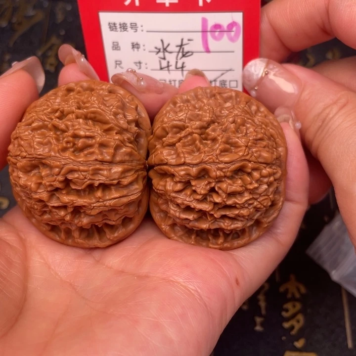 桃核吊坠任***文玩的好的