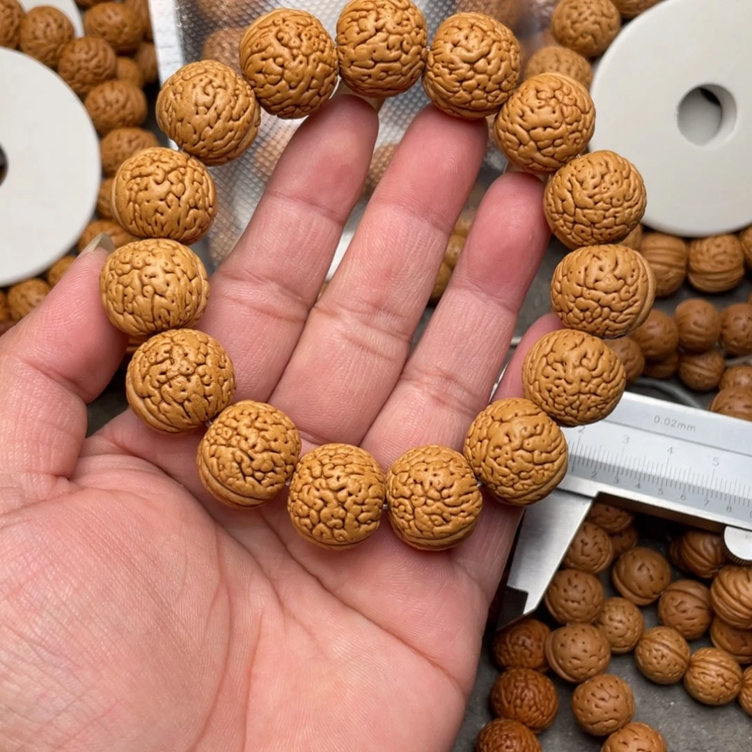 一***翀桃核手串虎皮肌肉闪4