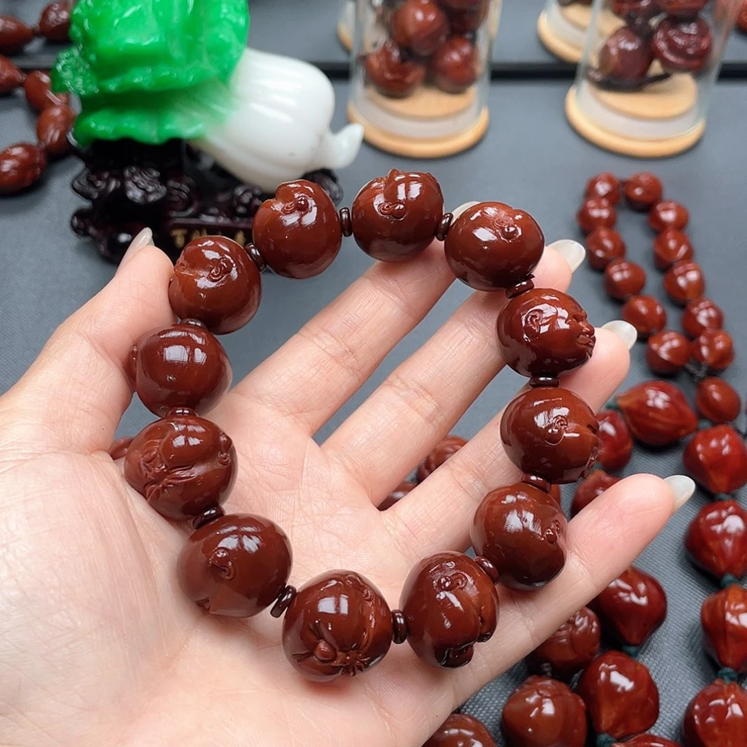 江***東手串橄榄核百态手串