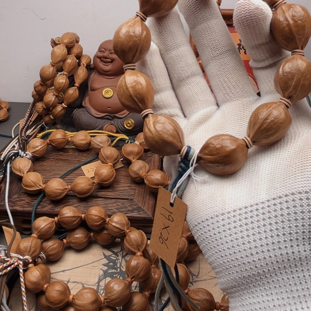 ****姜手串橄榄核19.26梅林铁核