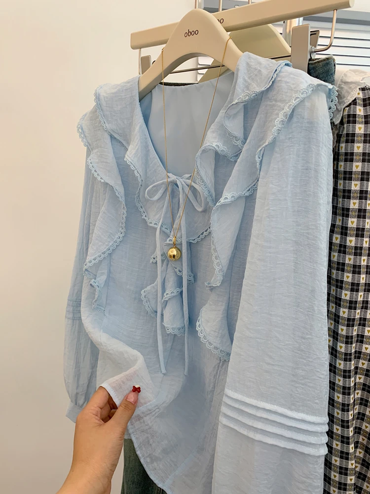 蓝色蝴蝶结衬衫上衣2025春季设计感小众独特超好看漂亮洋气小衫女