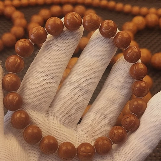 桃核吊坠极*10龙纹手串