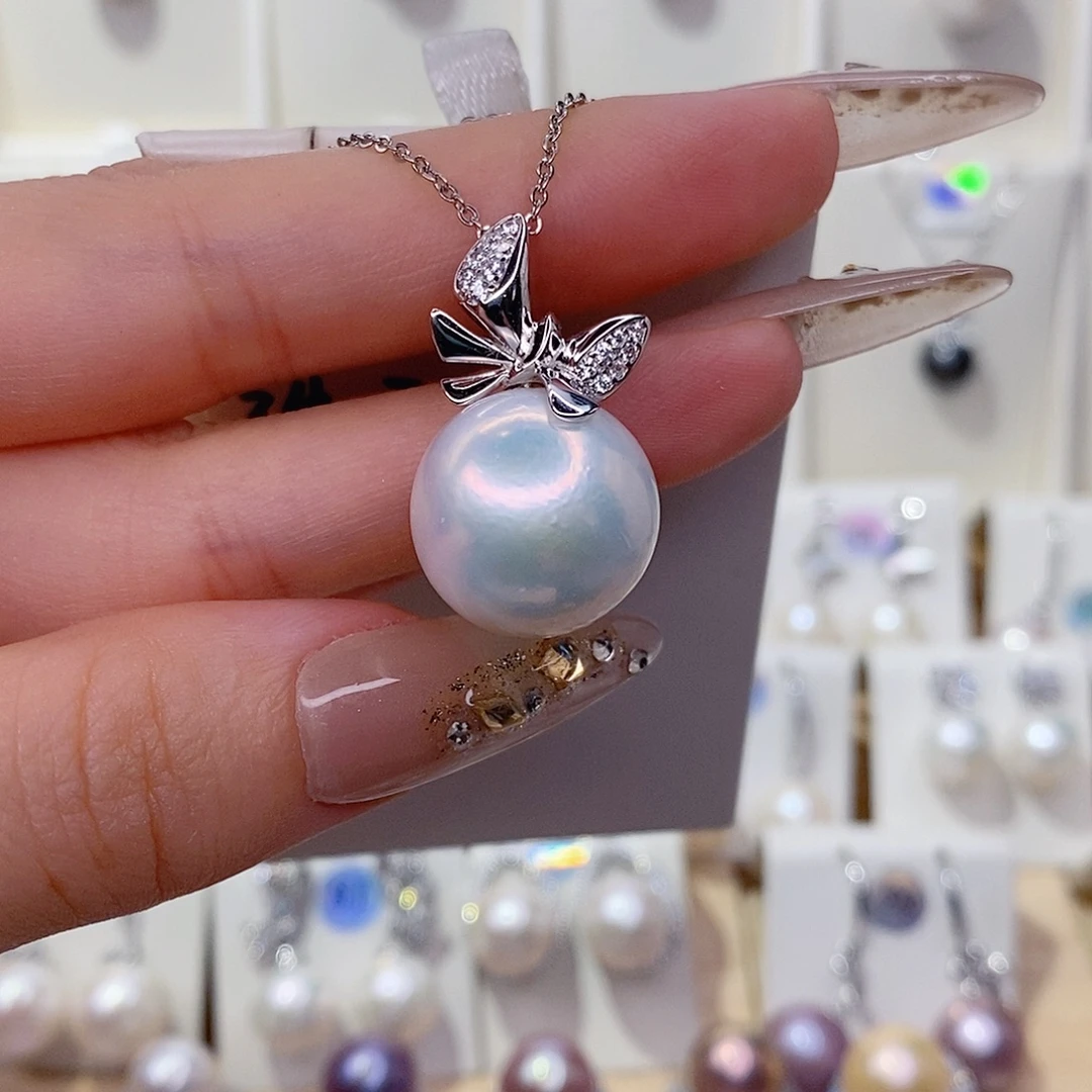 肥***妞淡水珍珠银S925镶嵌吊坠(赠链)17左右