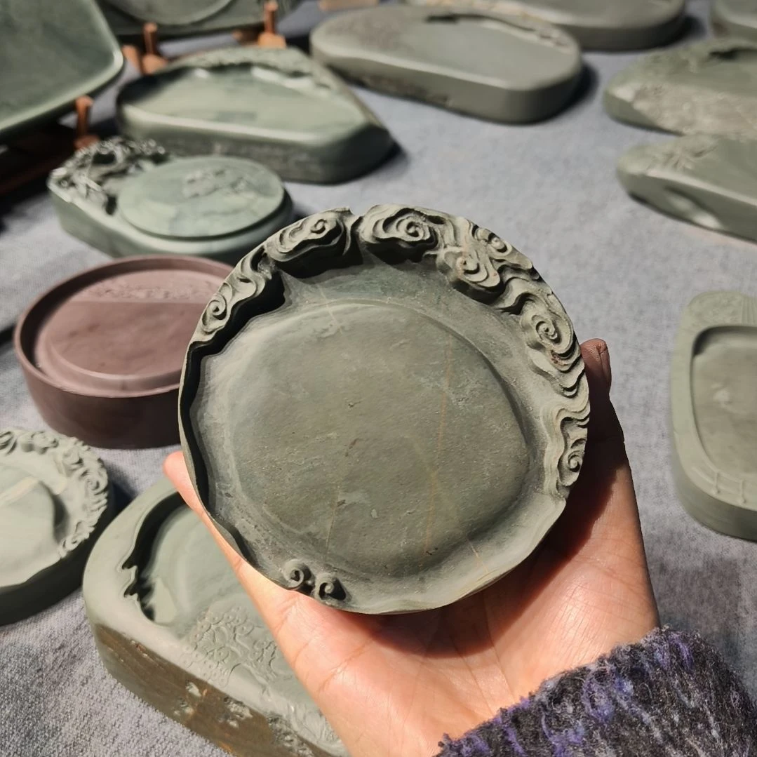 柠***树甘肃洮砚，水泉祥云砚