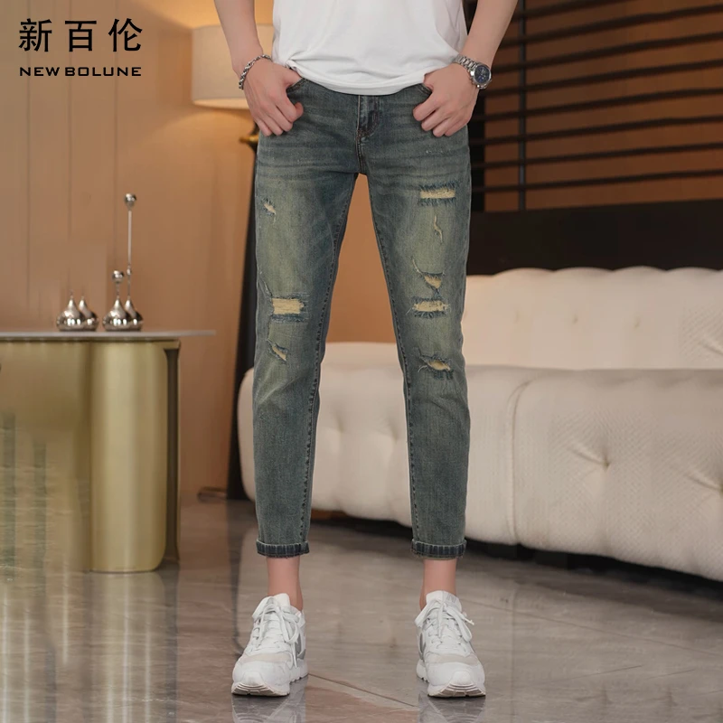 新百伦破洞牛仔裤复古2025年新款秋季小脚修身直筒休闲男款长裤潮