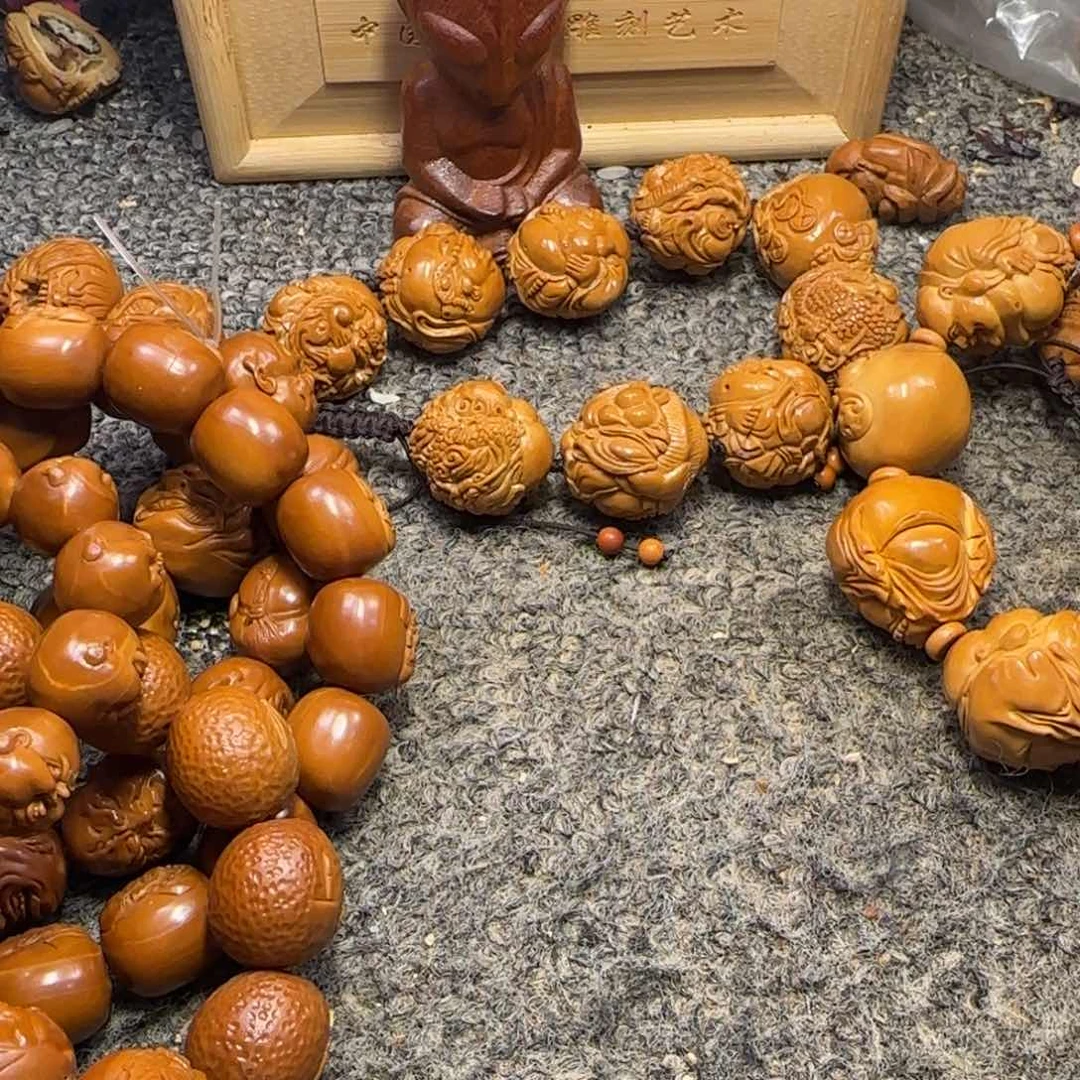 橄榄核吊坠小***?………………