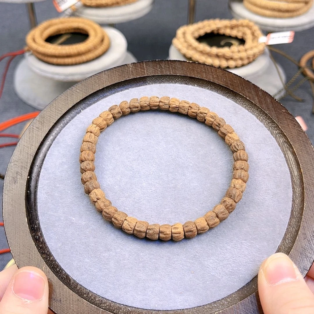 梁***。手串柏香籽/百香籽