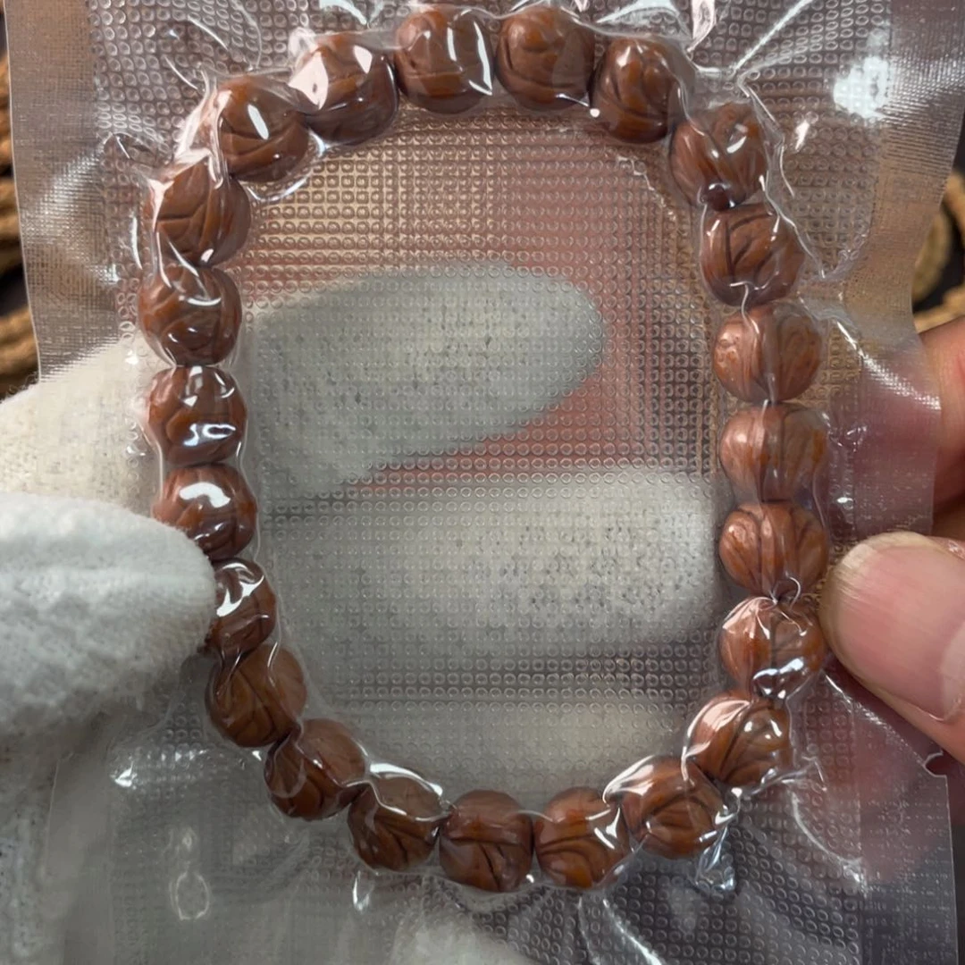 宇***士柏香籽/百香籽吊坠龙纹桃核