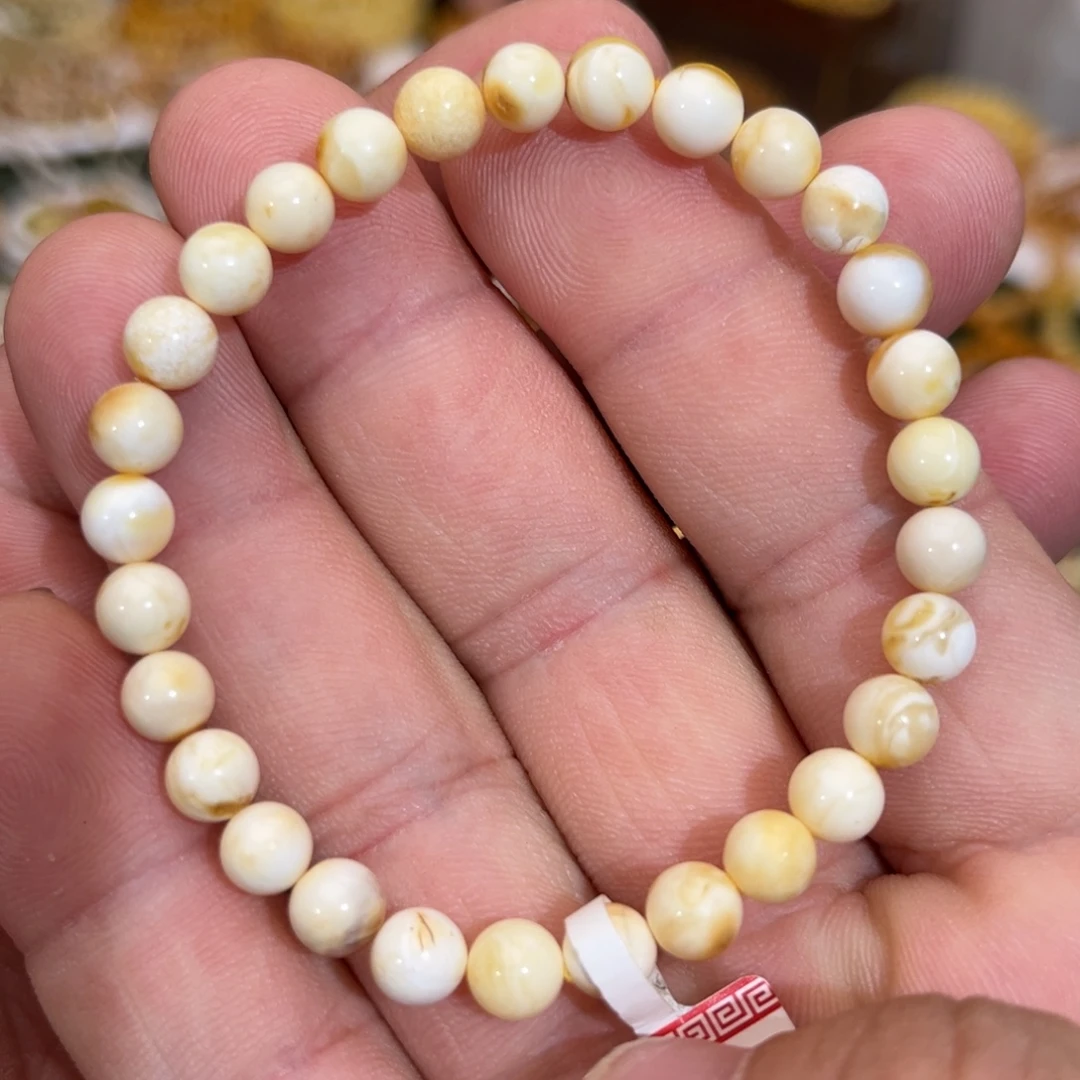 蜜蜡未镶嵌手链微瑕沁色瓷白溶洞妖花6.3mm