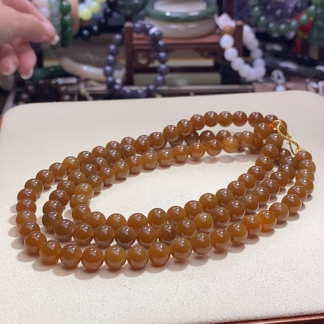 颈饰未镶嵌和田玉展**体且末糖银镶108链8MM