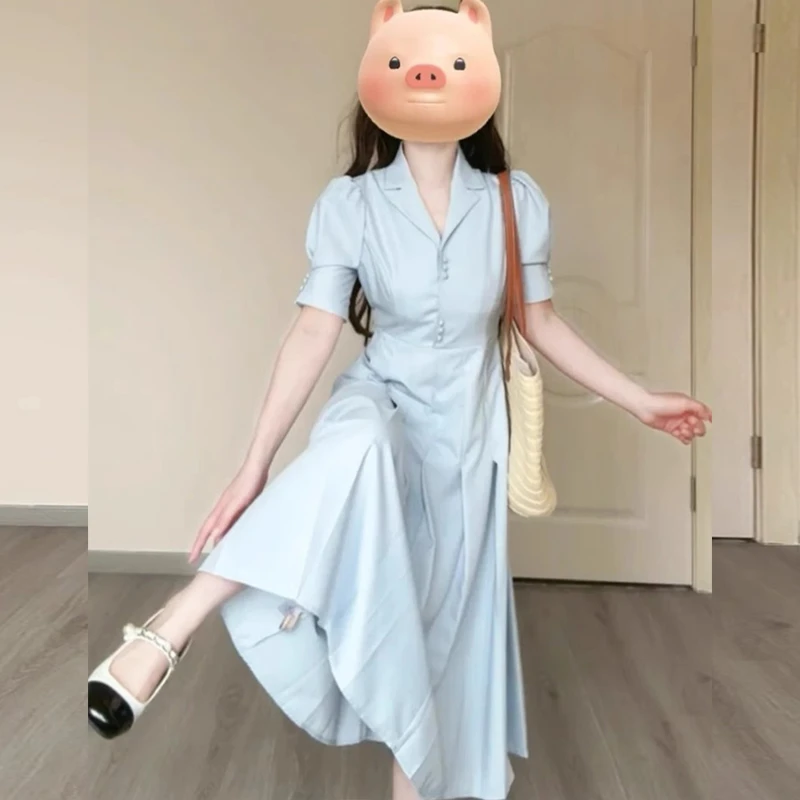 2025新款温柔风蓝色泡泡袖翻领连衣裙收腰海边度假长裙D1062