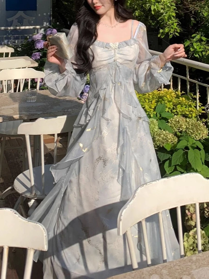 2025春季海边旅游气质灰蓝色晕染仙气蝴蝶烫金荷叶边长袖连衣裙女