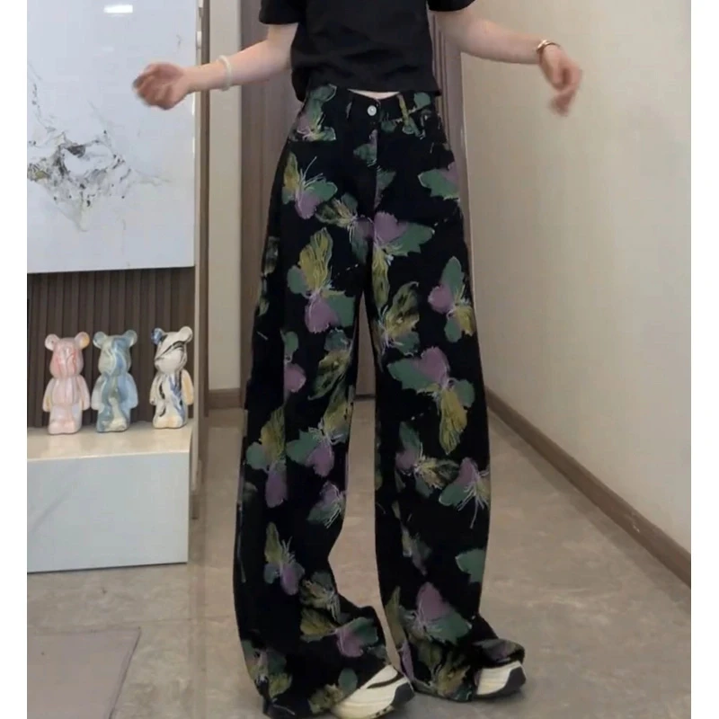 牛仔裤女2025年夏季新款爆款裤子高腰显瘦复古黑色蝴蝶印花阔腿裤