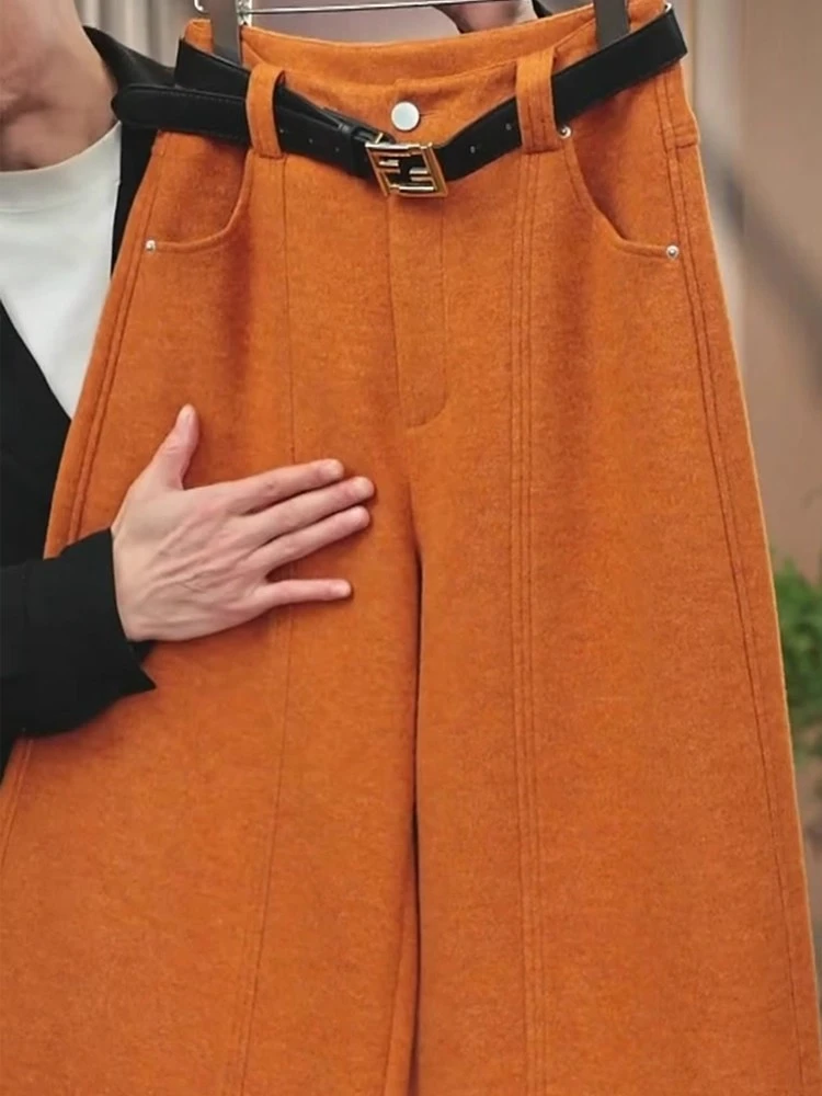 橘色毛呢阔腿裤女2025秋冬新款个性小众多巴胺垂感减龄直筒休闲裤