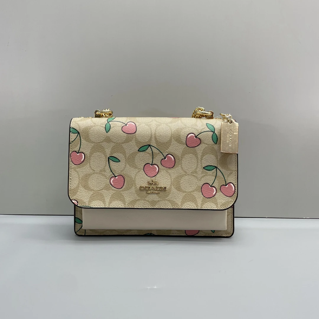 99新 COACH/蔻驰 小林/白拼樱桃风琴包22*16*5cmA072601