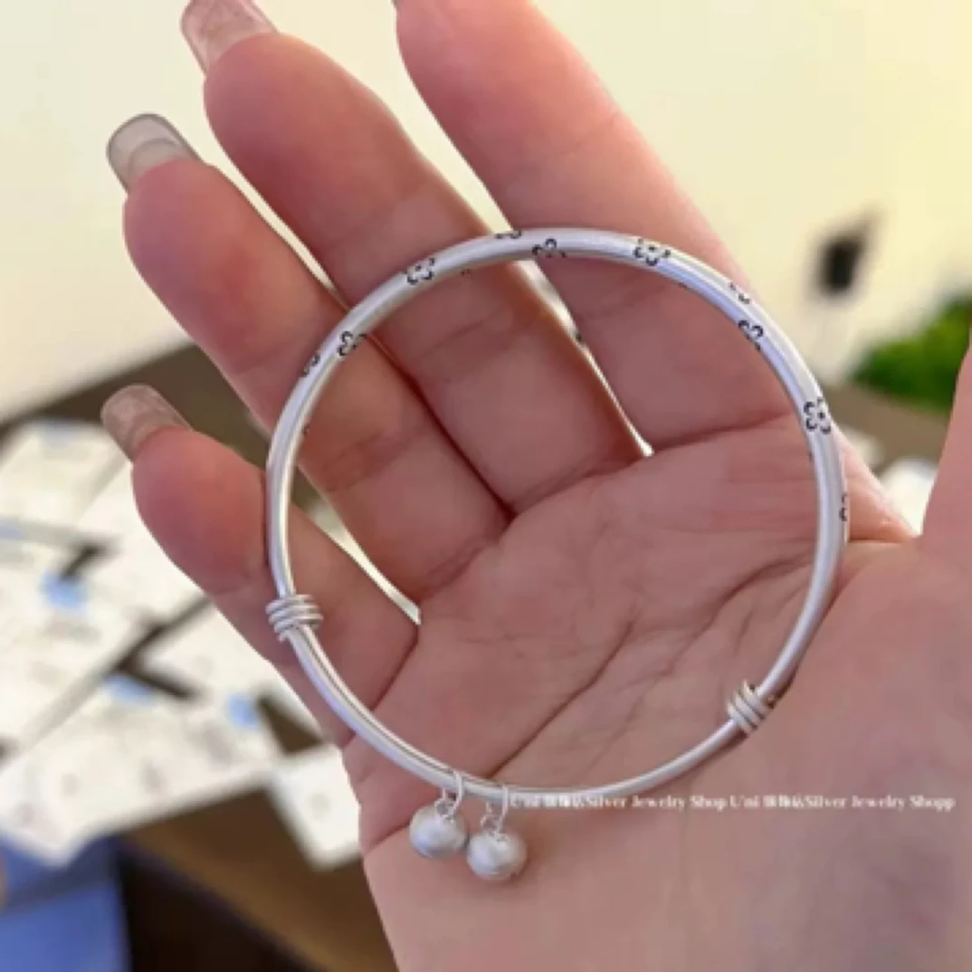 足银手镯 足银999 梅花足银实心推拉绕丝铃铛银镯子雕花手饰814