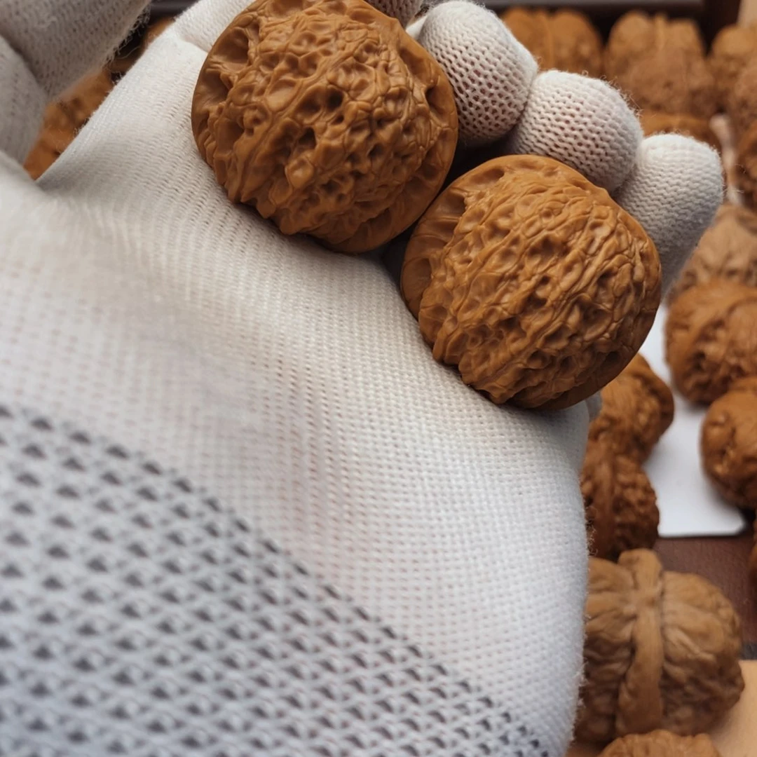 文玩核桃吊坠雀麒麟