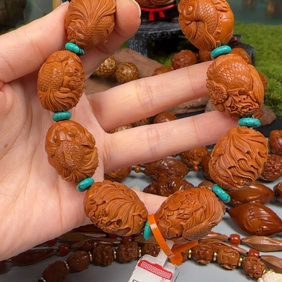 橄榄核手串/手链/0.5荷花鱼