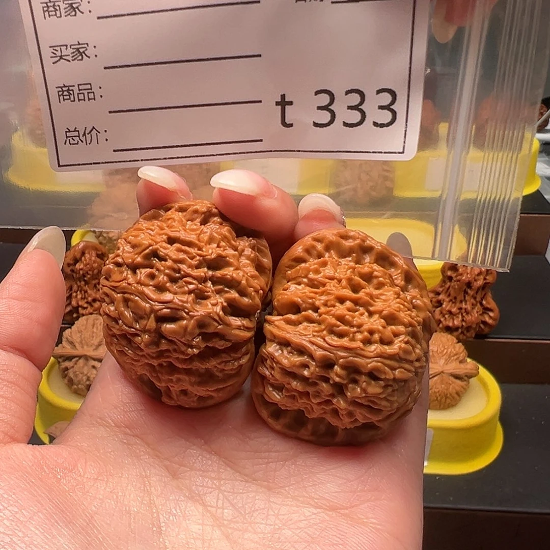 豐***轩文玩核桃手把件南疆石