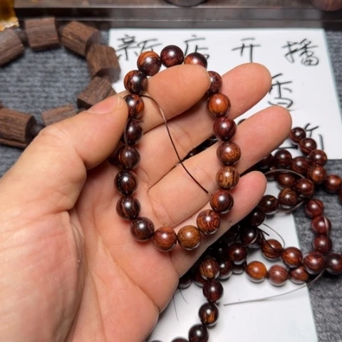 藤类y10海南红降1.0瑕疵圆珠单圈手串