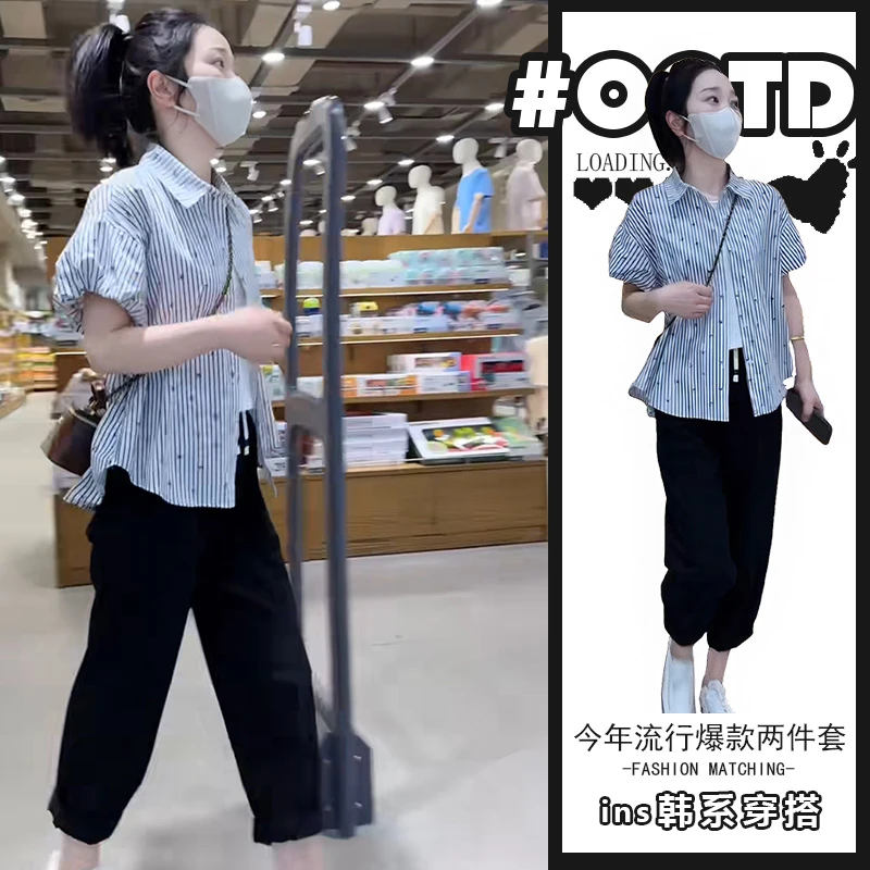 2025夏季设计感别致polo领衬衫黑色显瘦裤子女欧式简约两件套装潮