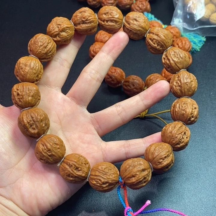 吊坠文玩核桃金鱼肚手持