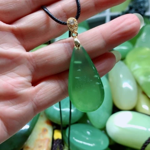 甜***酒蛇纹石玉未镶嵌手把件