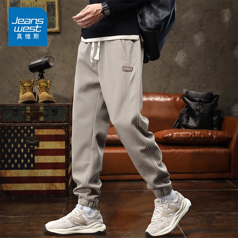 Jeanswest/真维斯男士潮流百搭运动卫裤春秋宽松拼接束脚休闲裤子
