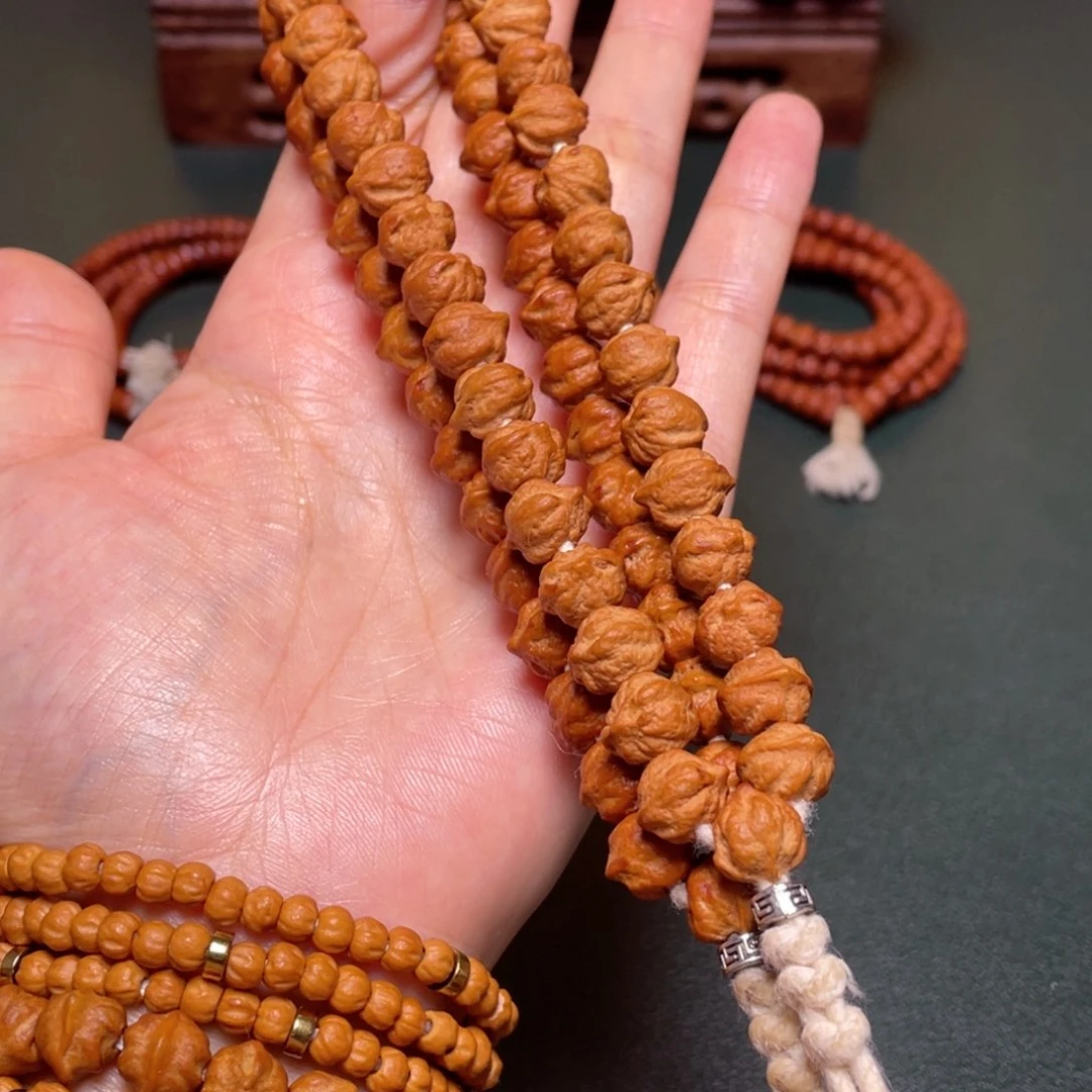 柏香籽/百香籽吊坠白牙横打手持