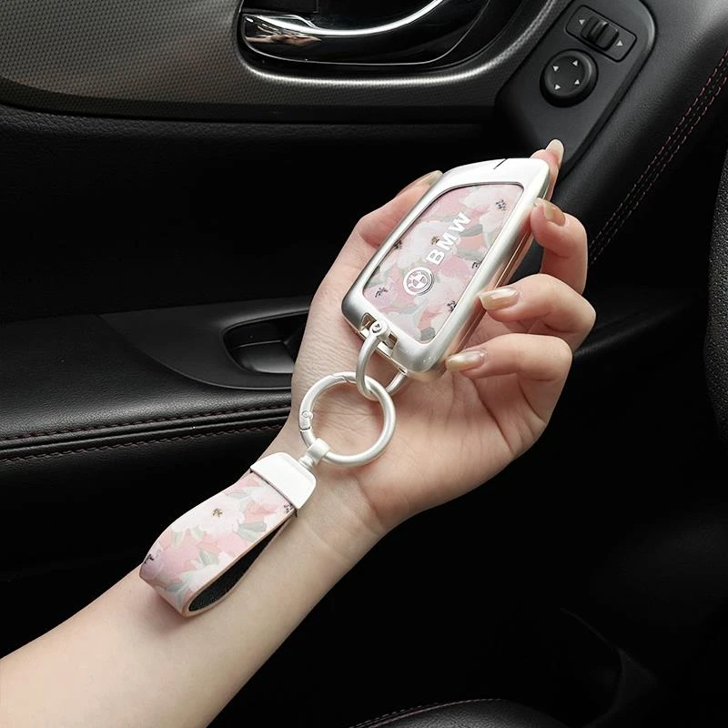 适用BMW钥匙套5系3系320i真皮彩印X1X2X3高端女款X4X6X5X7车标扣