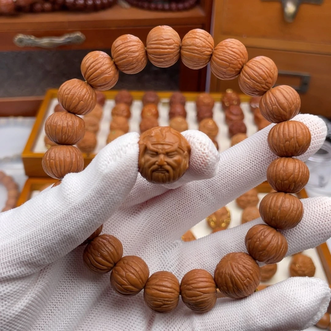 福***斯桃核手串猴头核桃雕刻