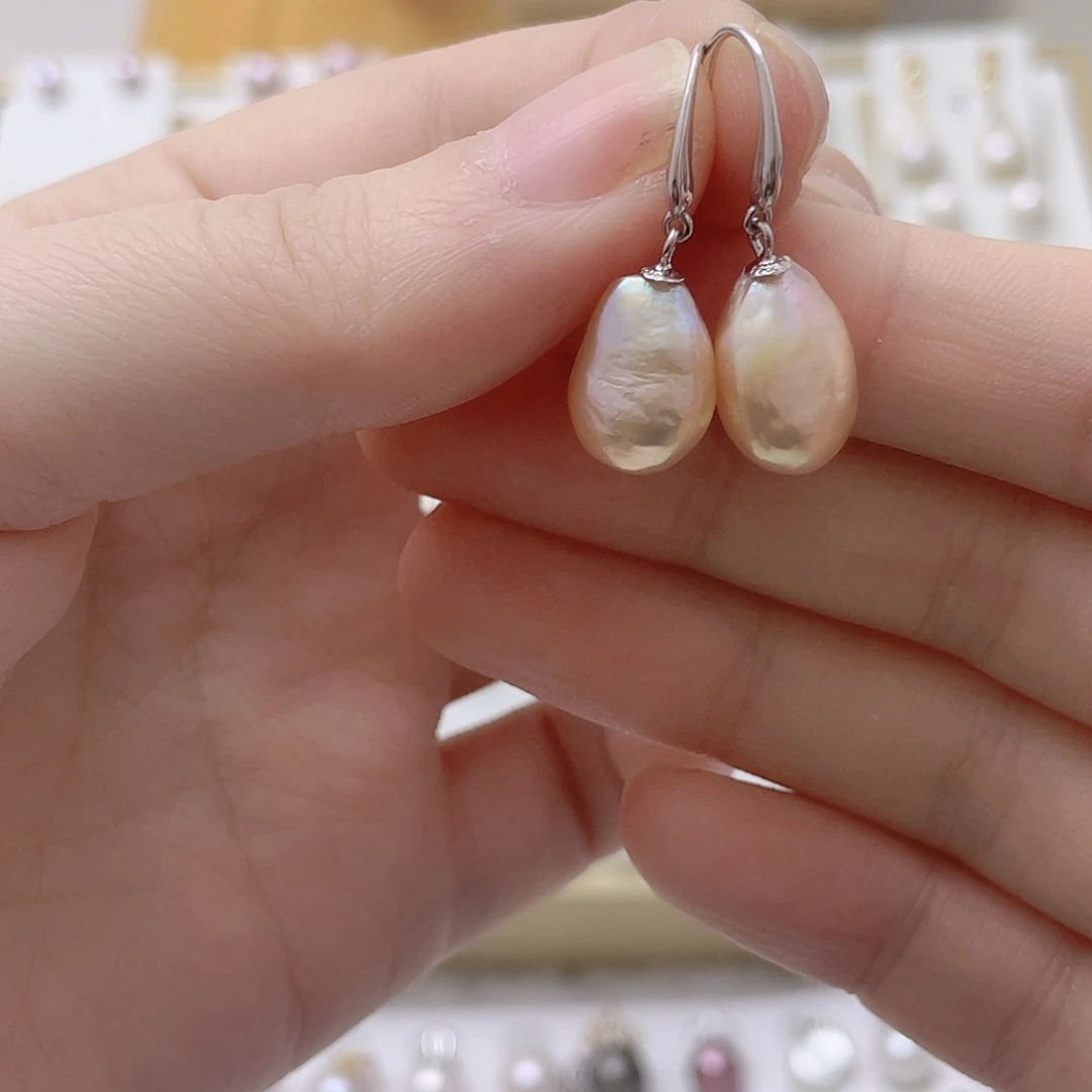 蜜***桃淡水珍珠银S925镶嵌耳饰