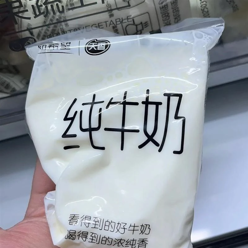 新希望天香网红透明袋纯牛奶整箱早餐奶180ml*12袋