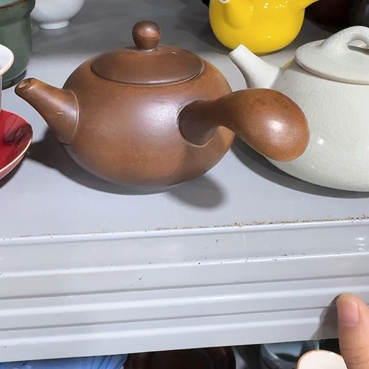 主人杯一个，瓷。。品茗