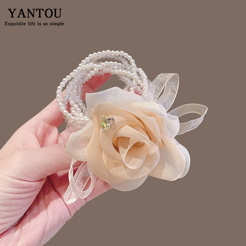 精致甜美玫瑰花朵蝴蝶结水晶皮筋2025新潮高级感后脑勺扎头绳新款