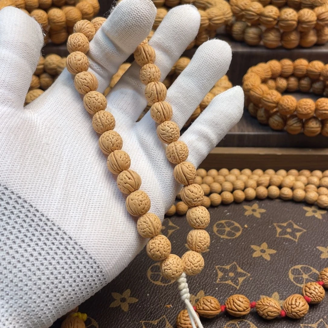 手串桃核洋**亿野生脑纹金豆