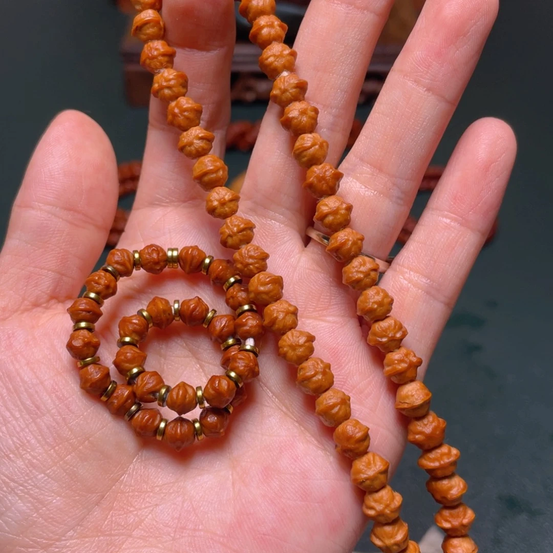 舒***克柏香籽/百香籽吊坠迷你手持