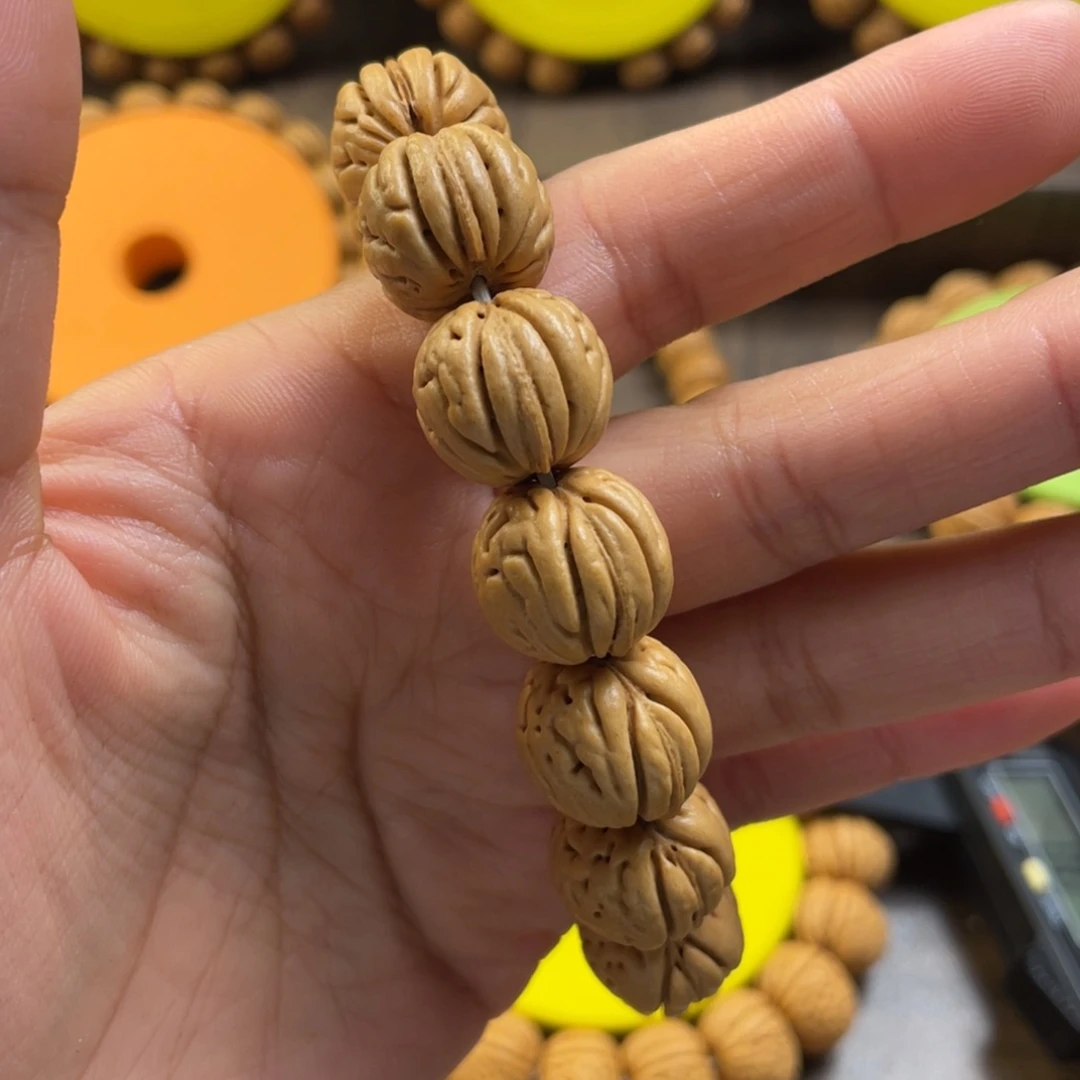 桃核手串未**。野生金丹