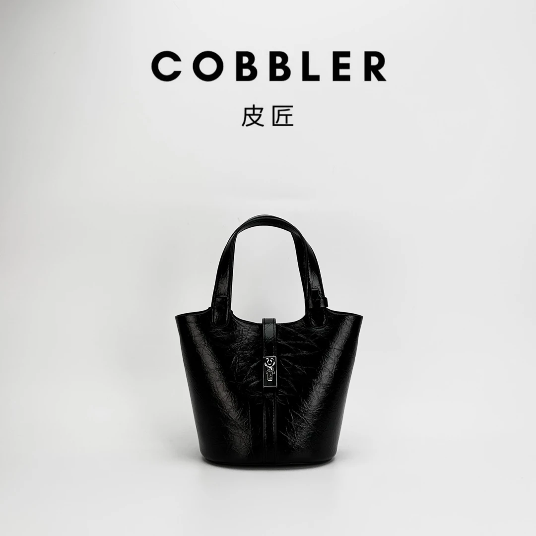 【皮先生】设计款7049菜篮子手提单肩斜挎简约百搭大气时尚女包包