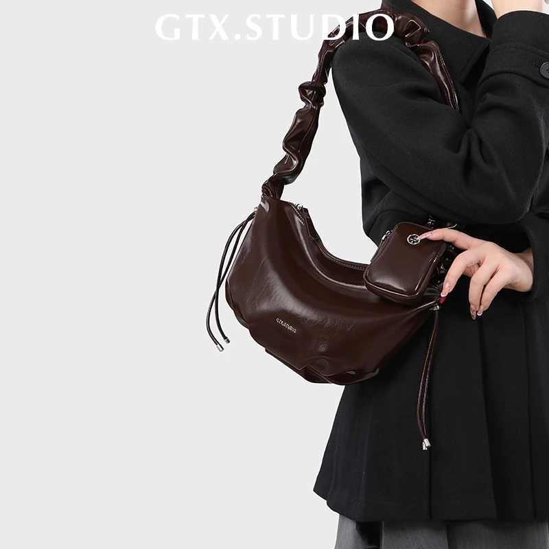 【谷田西】小众2024新款美拉德腋下饺子包软牛皮慵懒牛角包女斜挎