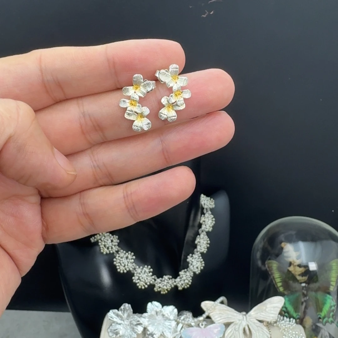925银羽毛小黄花耳钉