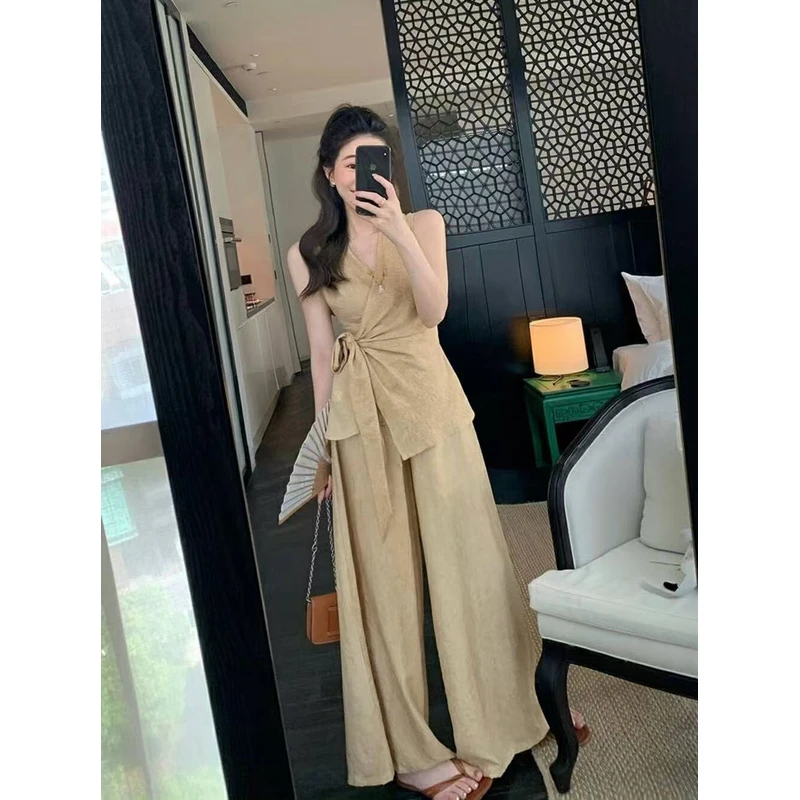 “两件套！！”设计感一片式绑带无袖小衫松紧高腰阔腿裤！！太高级了！