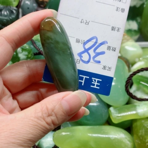 未镶嵌蛇纹石玉手把件