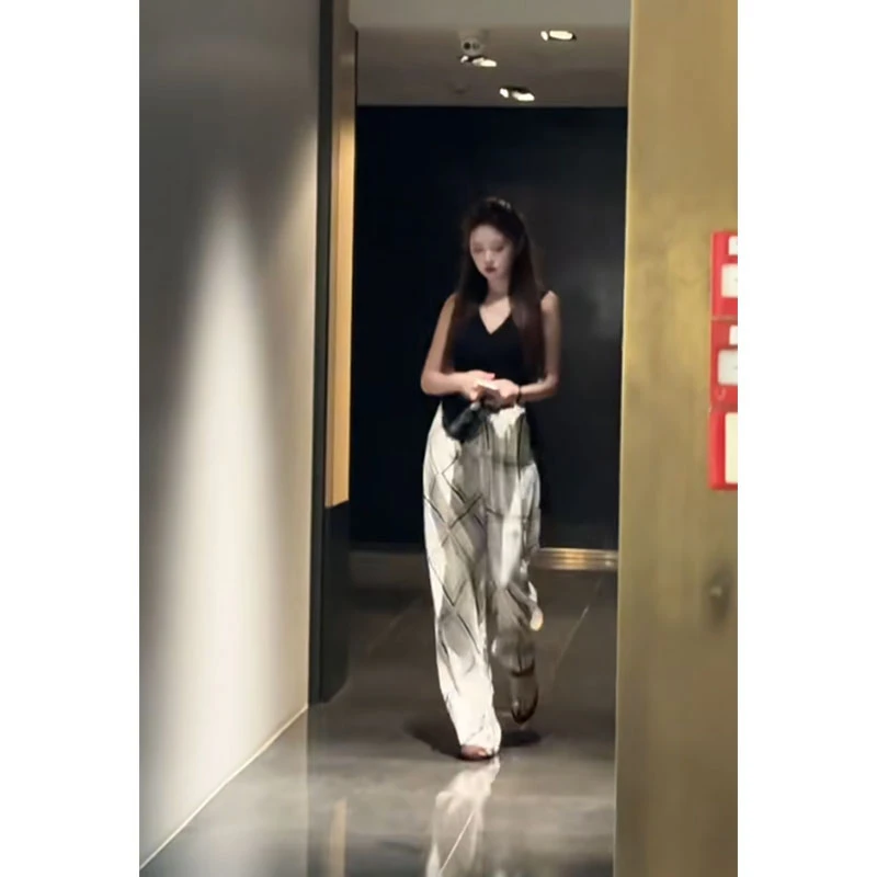 韩系纯欲夏季新款2025设计感不规则黑色上衣高腰直筒格纹阔腿裤女