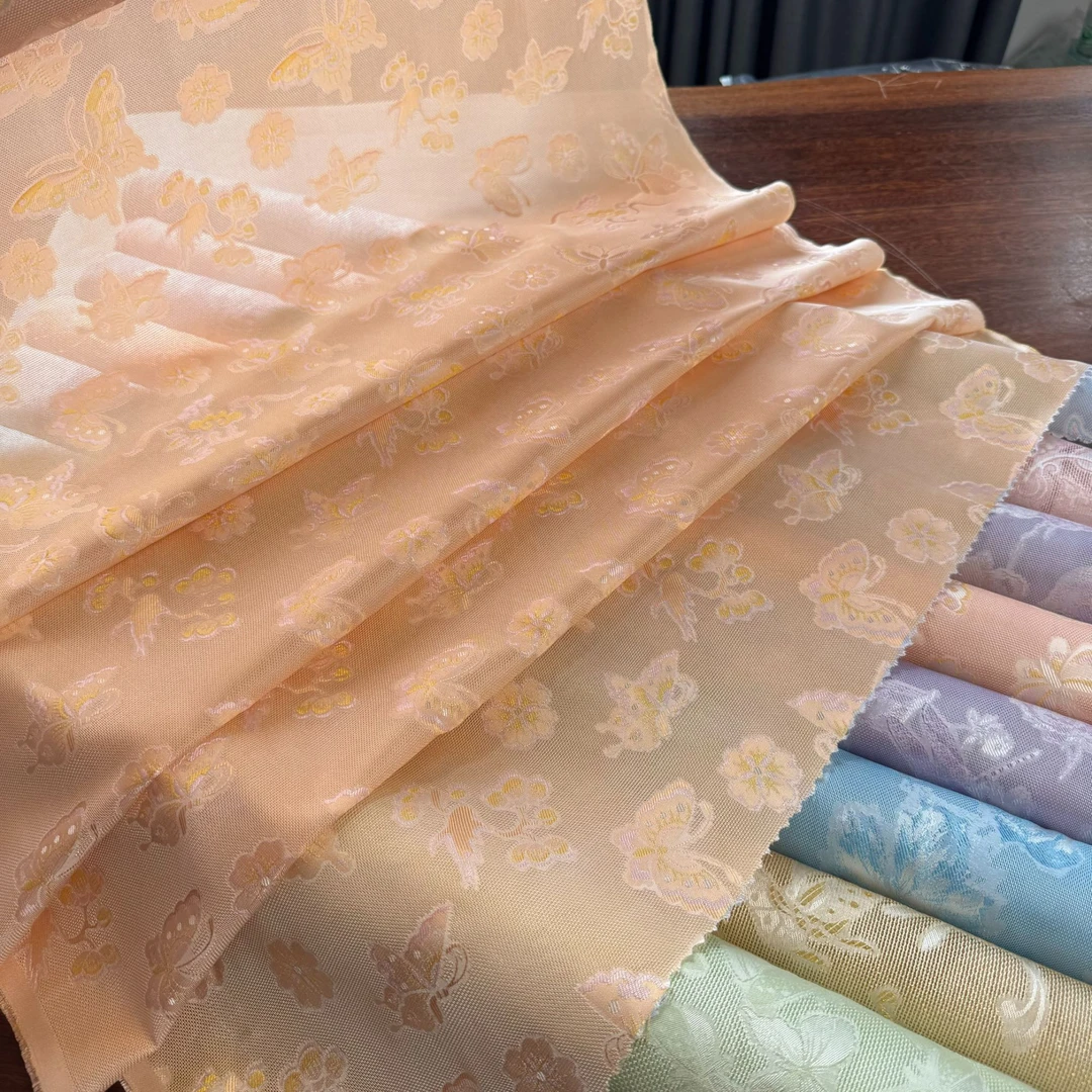 70CM宽  橙色蝴蝶提花罗四经绞萝新中式桑蚕丝面料轻薄