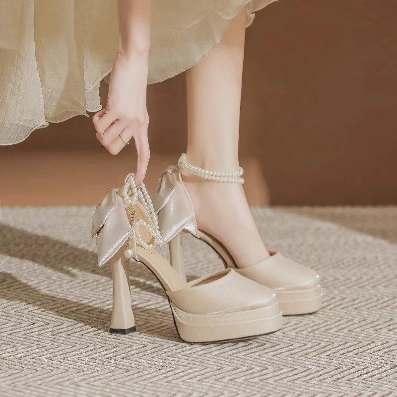 一字扣中空防水台高跟鞋粗跟女春夏2025新款蝴蝶结香槟色婚鞋12cm