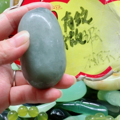 未镶嵌蛇纹石玉手把件