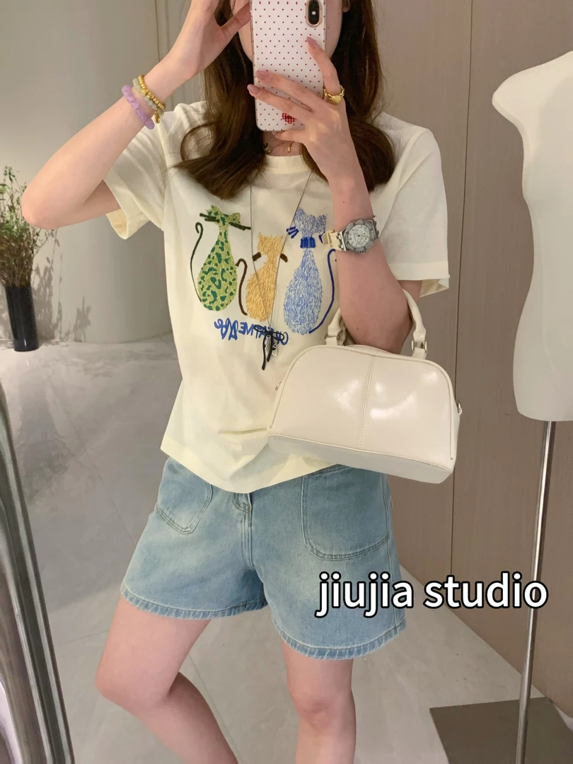 九佳 【时光日记】云感雪花肤感宽松搞怪猫咪印花T 显瘦短袖T恤