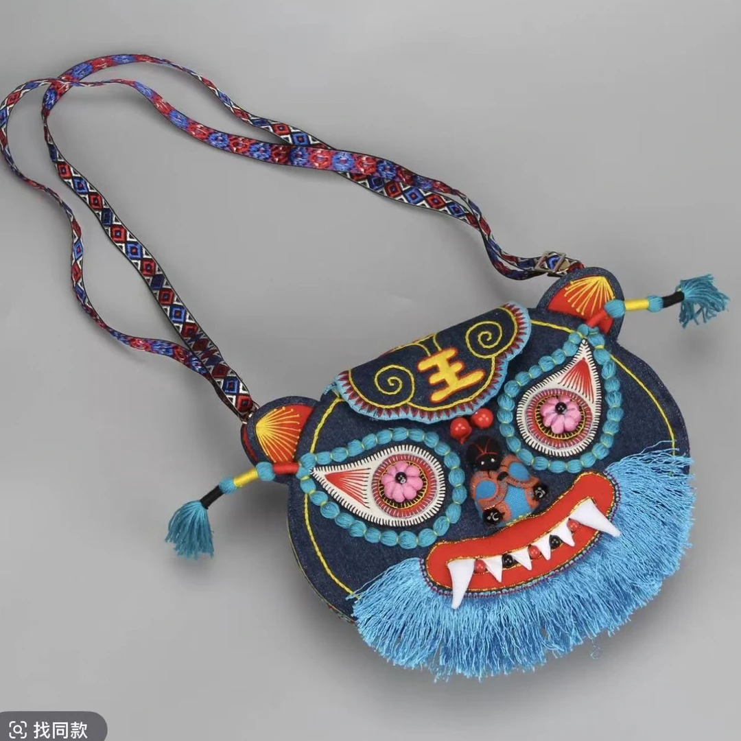 庆阳香包民族风刺绣狮头单肩斜挎包女款原创手工刺绣潮包