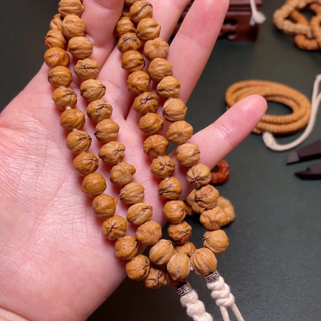 柏香籽/百香籽吊坠恶魔之眼手持